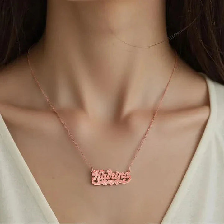 Model wearing the 14 Karat Diamond Cut & Florentine Name Necklace in 14K rose gold personalized with the name Katrina | AJ's Jewelry
