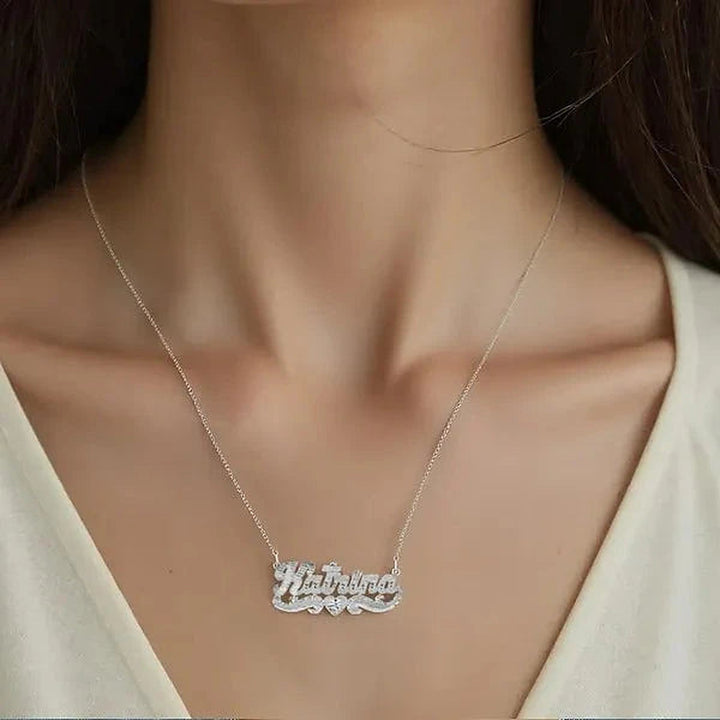 Model wearing the 14 Karat Diamond Cut & Florentine Name Necklace in 14K white gold, name Katrina | AJ's Jewelry