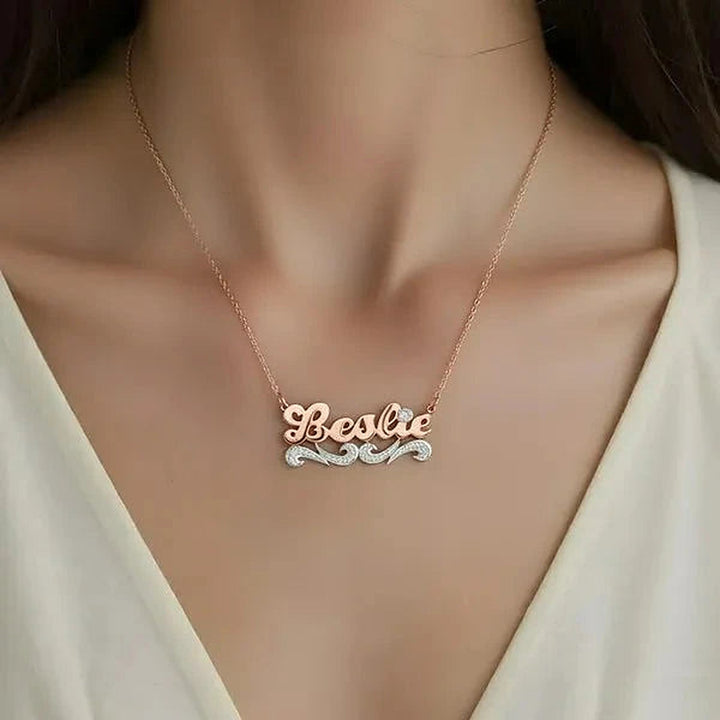 Model wearing the 14 Karat Script Name Necklace with Tail in 14K rose gold personalized with the name Leslie | AJ's Jewelry