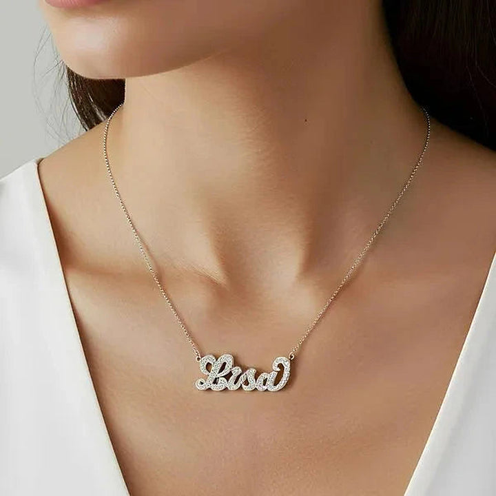 Model wearing the 14 Karat Diamond Cut 3D Name Necklace in 14K white gold personalized with the name Lisa | AJ's Jewelry