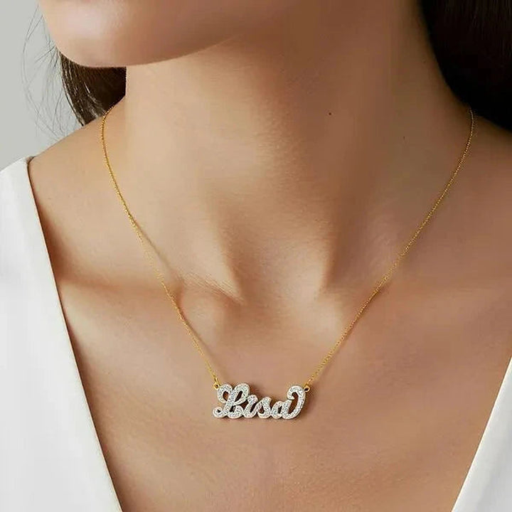 Model wearing the 14 Karat Diamond Cut 3D Name Necklace in 14K yellow gold personalized with the name Lisa | AJ's Jewelry