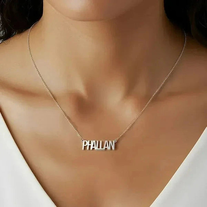 Model wearing the Sterling Silver Thin Letter Name Necklace personalized with the name Phallan | AJ's Jewelry