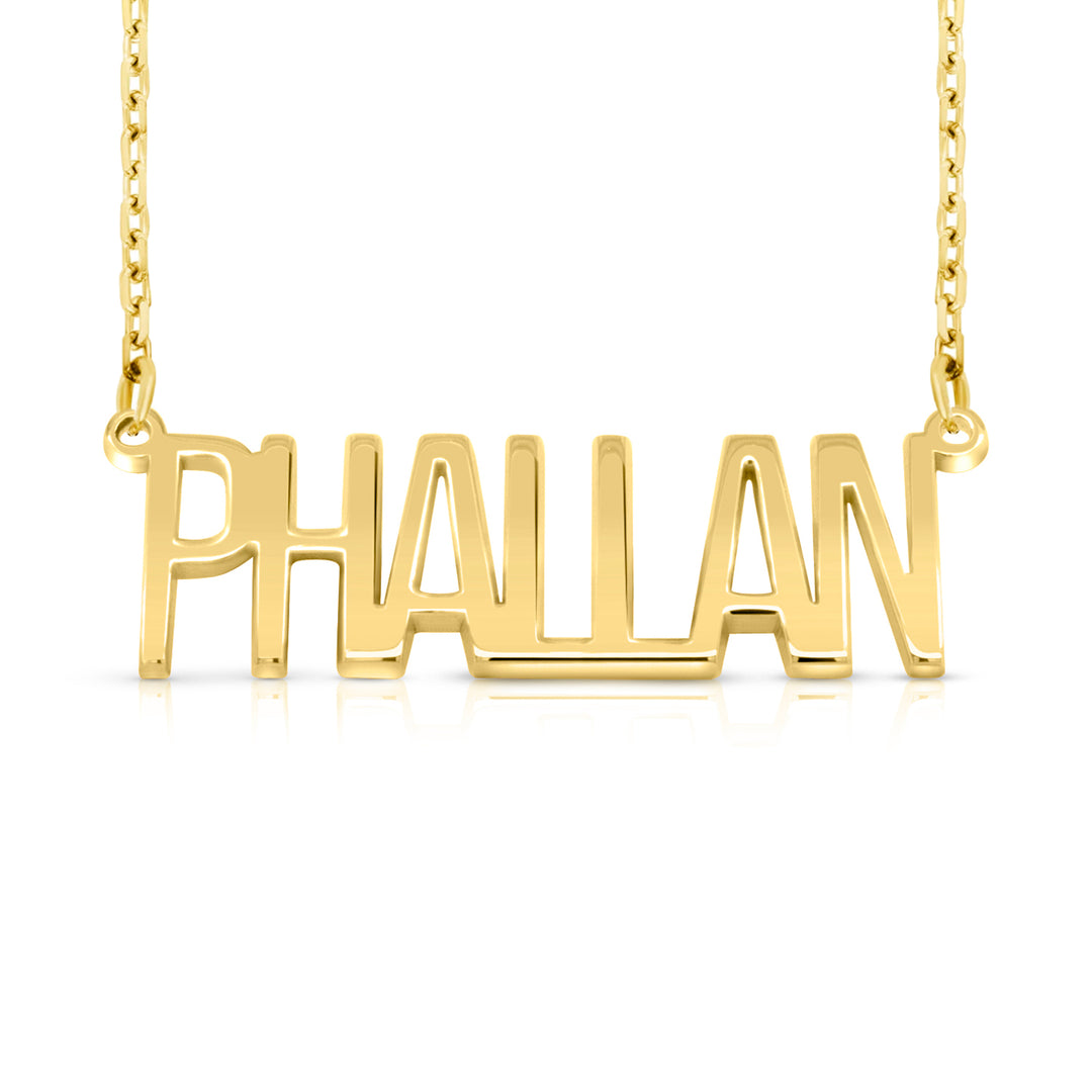 A gold nameplate necklace spelling 'PHALLAN' in a bold, uppercase, sans-serif font, suspended from a delicate gold chain against a plain white background.  This photo can change appearance depending on the name input using the custom name builder