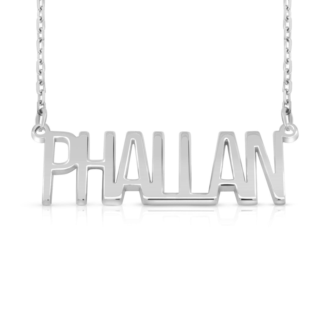 A silver nameplate necklace spelling 'PHALLAN' in a bold, uppercase, sans-serif font, suspended from a delicate silver chain against a plain white background.  This photo can change appearance depending on the name input using the custom name builder
