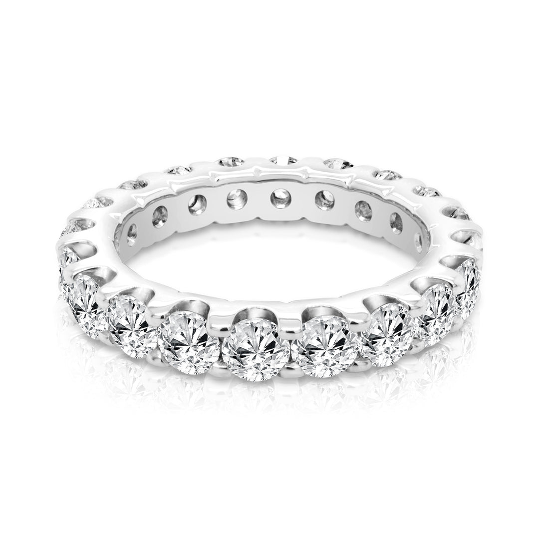 Platinum 3ct lab grown diamond eternity band, front view of the shared-prong round diamonds