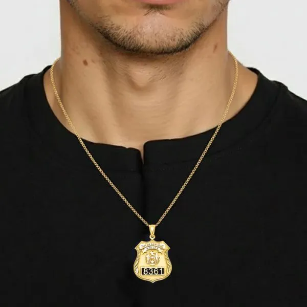 Yellow Gold Personalized Police Badge on a male model wearing a black shirt