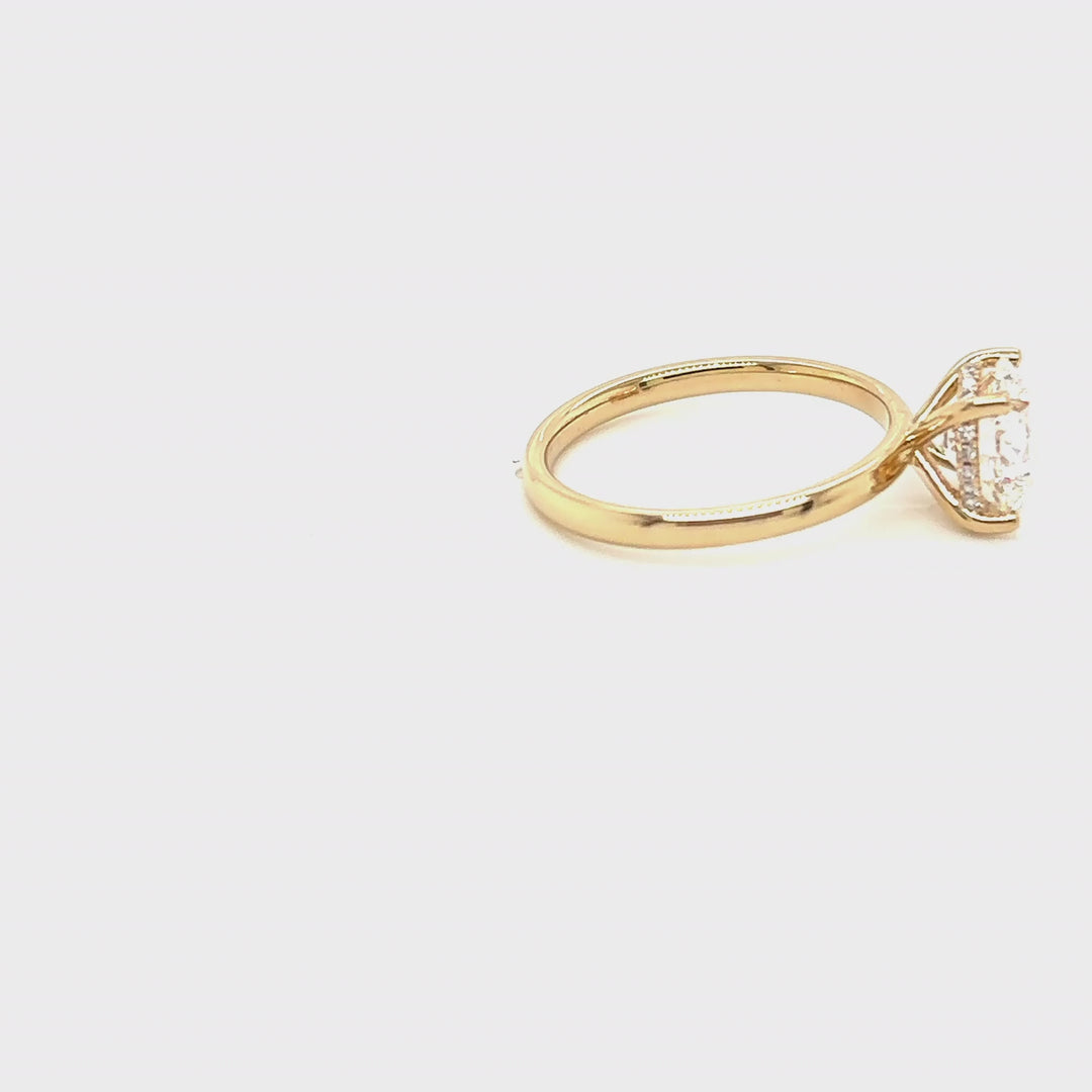 Rotating video of the 14 Karat Gold 2ct round lab grown diamond hidden halo engagement ring at AJ's Jewelry in Queens, NY