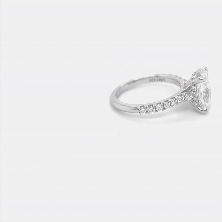Rotating video of the 14 Karat White Gold elongated cushion lab grown diamond hidden halo engagement ring at AJ's Jewelry in Queens, NY
