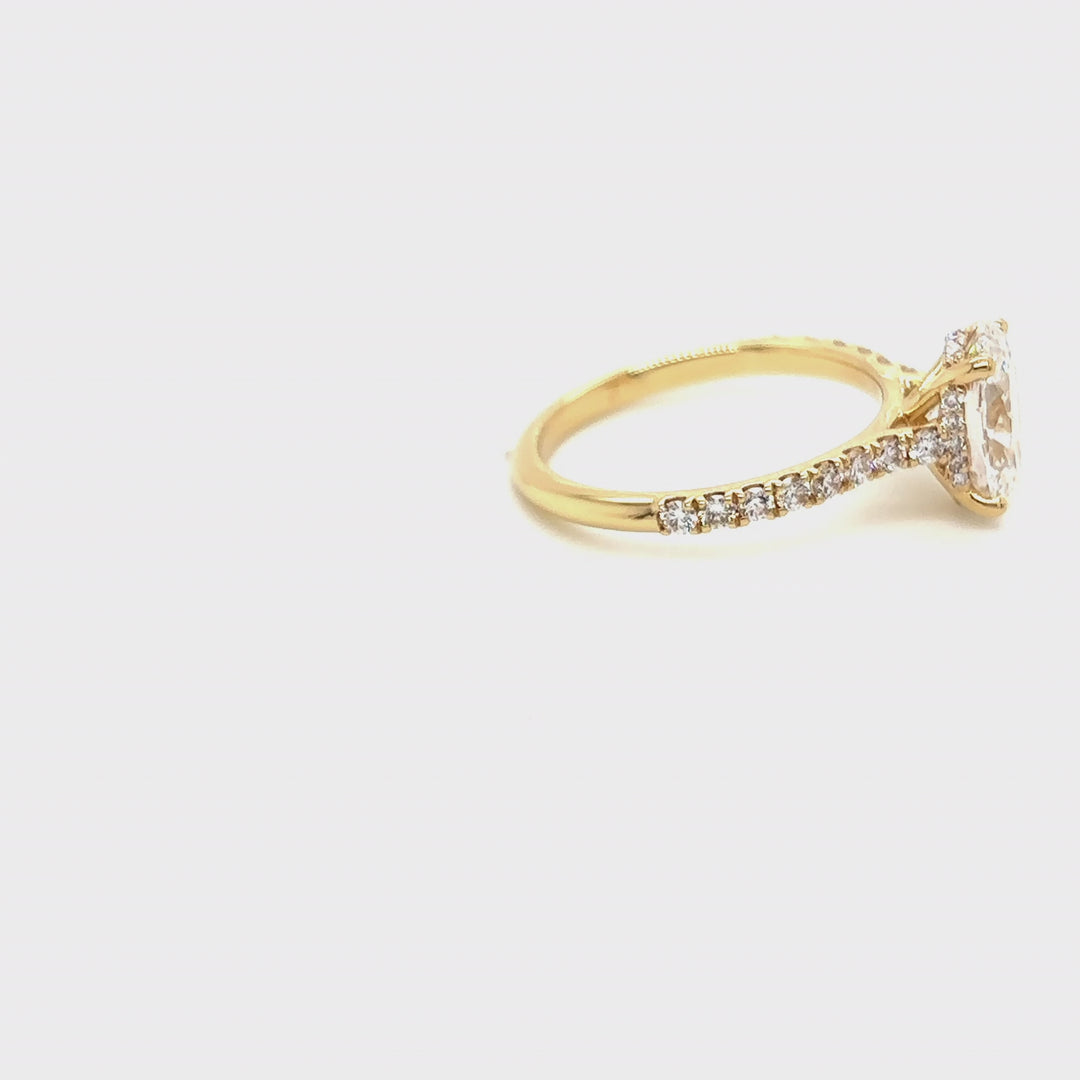 Rotating video of the 18 Karat Gold oval lab grown diamond hidden halo engagement ring at AJ's Jewelry in Queens, NY