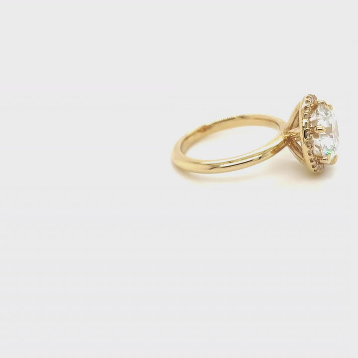 Rotating video of the 14 Karat Gold 3ct round halo lab grown diamond engagement ring at AJ's Jewelry in Queens, NY