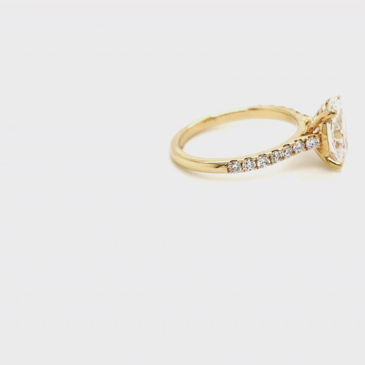 Rotating video of the 14 Karat Gold 2ct oval lab grown diamond engagement ring with cathedral mounting at AJ's Jewelry in Queens, NY