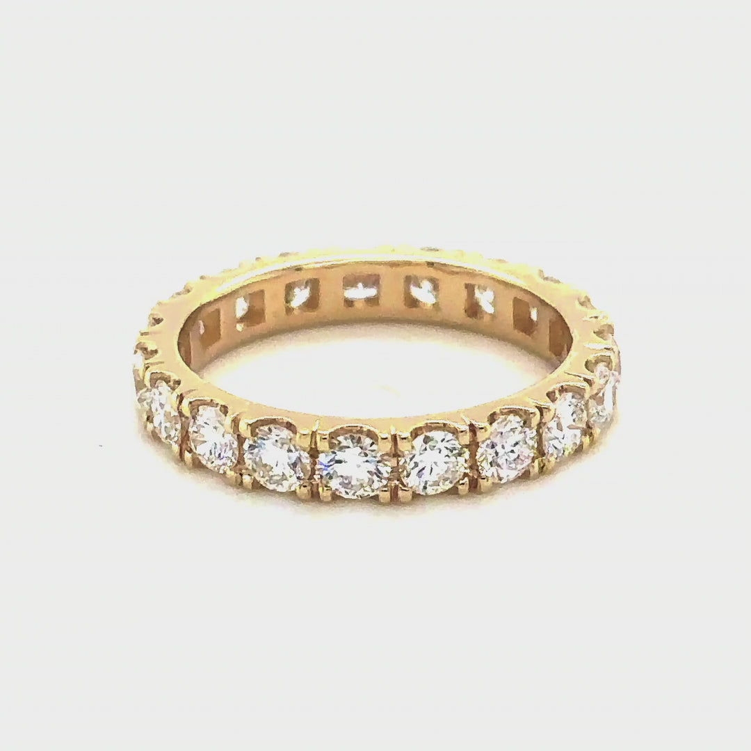 Rotating video of the 14 Karat yellow gold lab grown diamond eternity band at AJ's Jewelry in Queens, NY