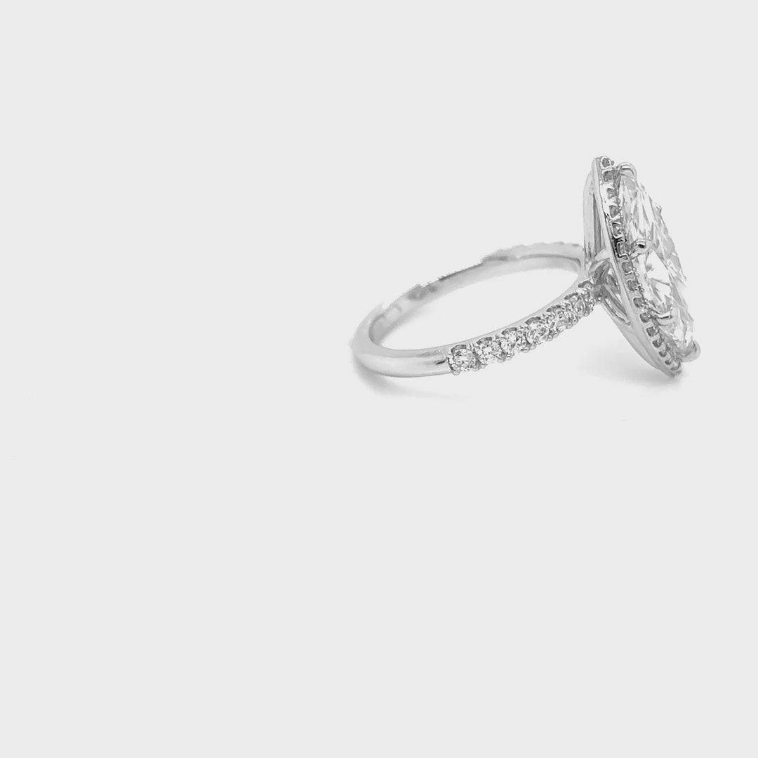Rotating video of the 14 Karat Gold 3ct marquise lab grown diamond engagement ring with halo at AJ's Jewelry in Queens, NY