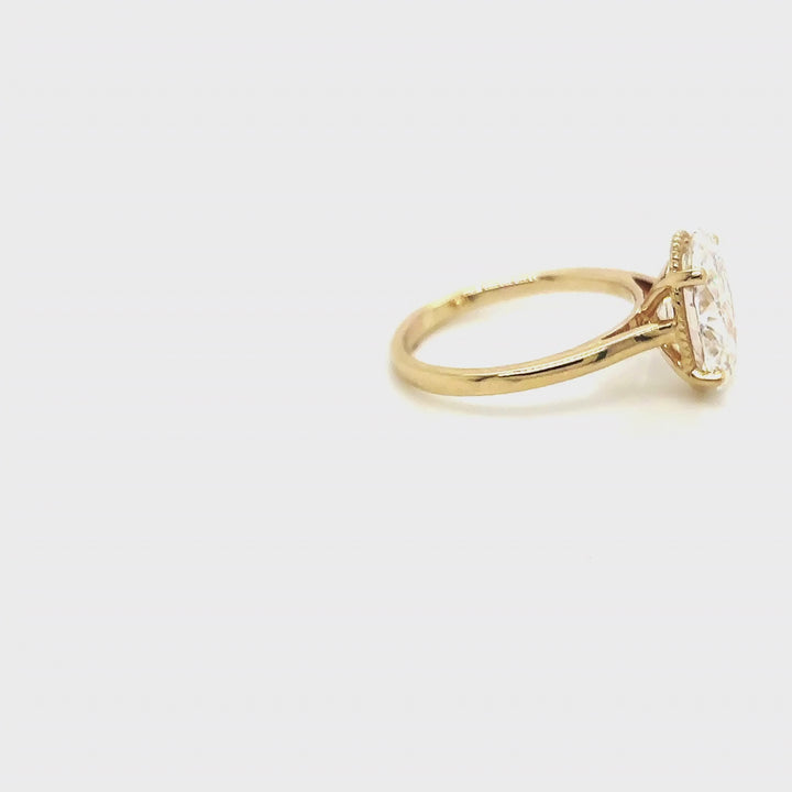 Rotating video of the 14 Karat Gold 3ct oval lab grown diamond solitaire engagement ring with milgrain detail at AJ's Jewelry in Queens, NY