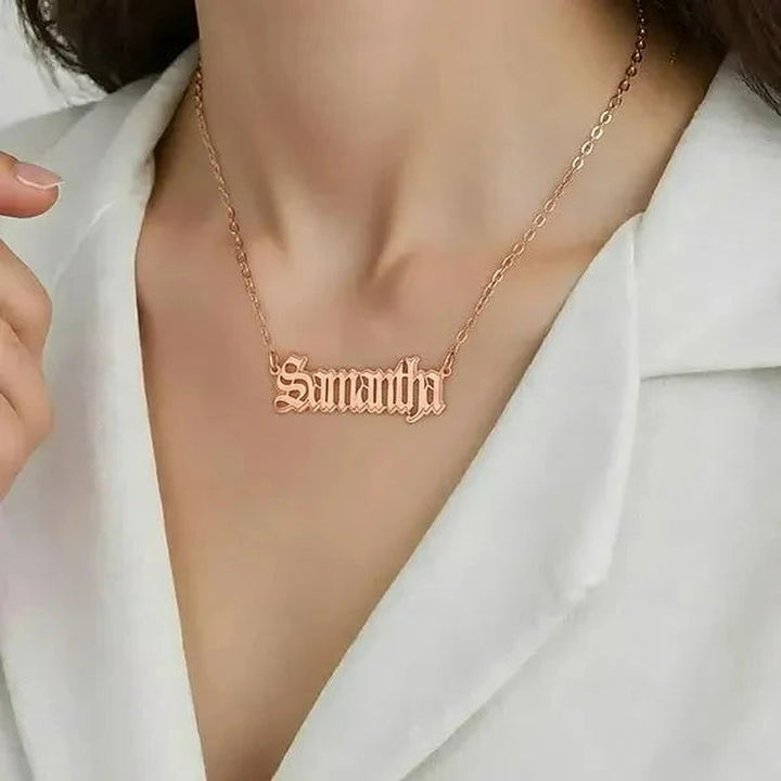 Model wearing the 14 Karat Gothic Style Name Necklace in 14K rose gold personalized with the name Samantha | AJ's Jewelry