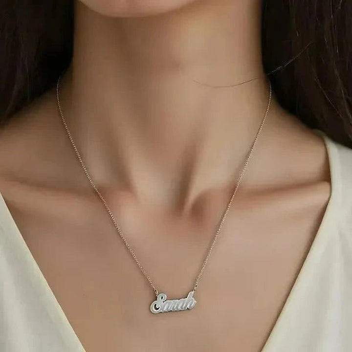 Model wearing the 14 Karat Fancy Script Name Necklace in 14K white gold personalized with the name Sarah | AJ's Jewelry