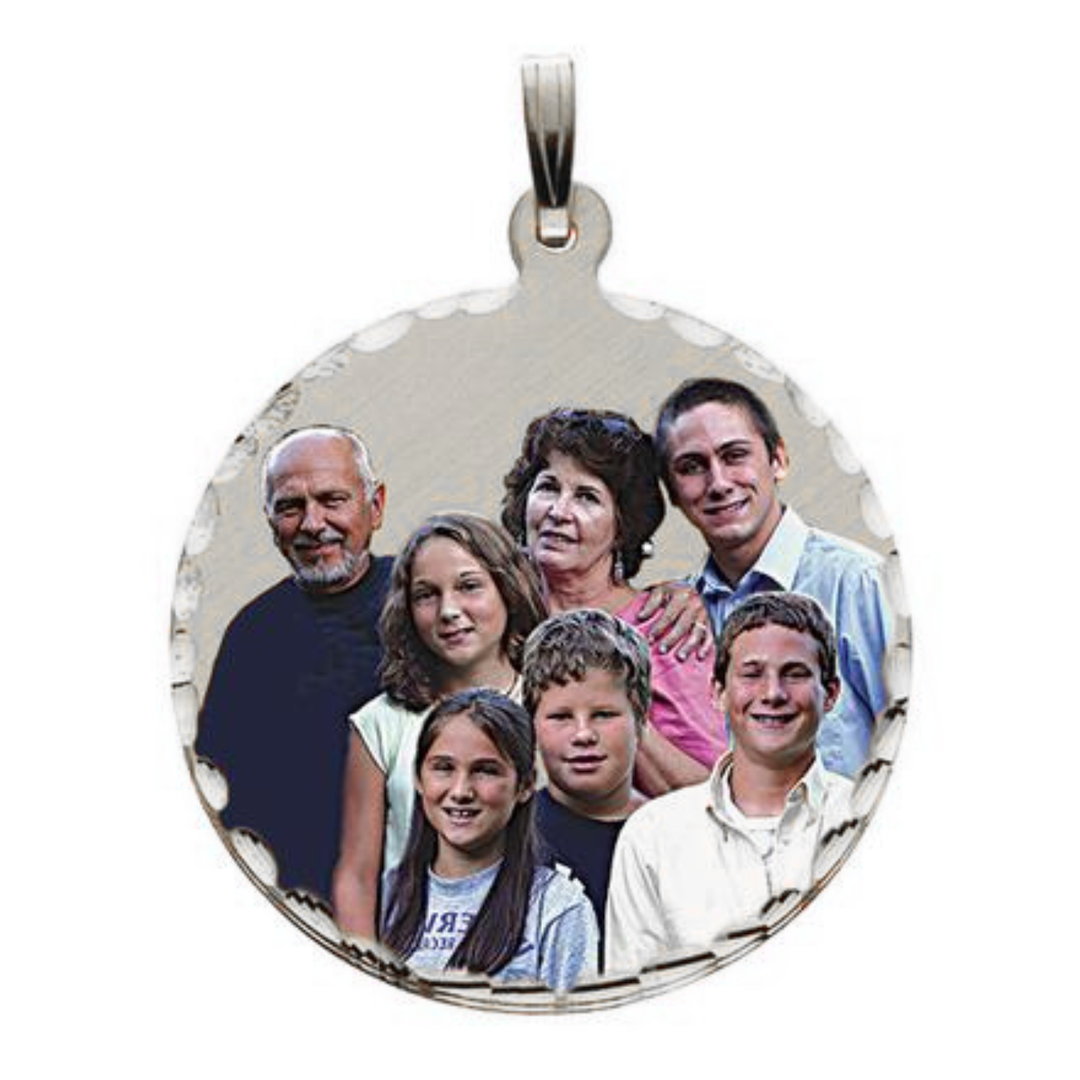 A round silver pendant with a family photo printed in the center, shown against a plain white background.