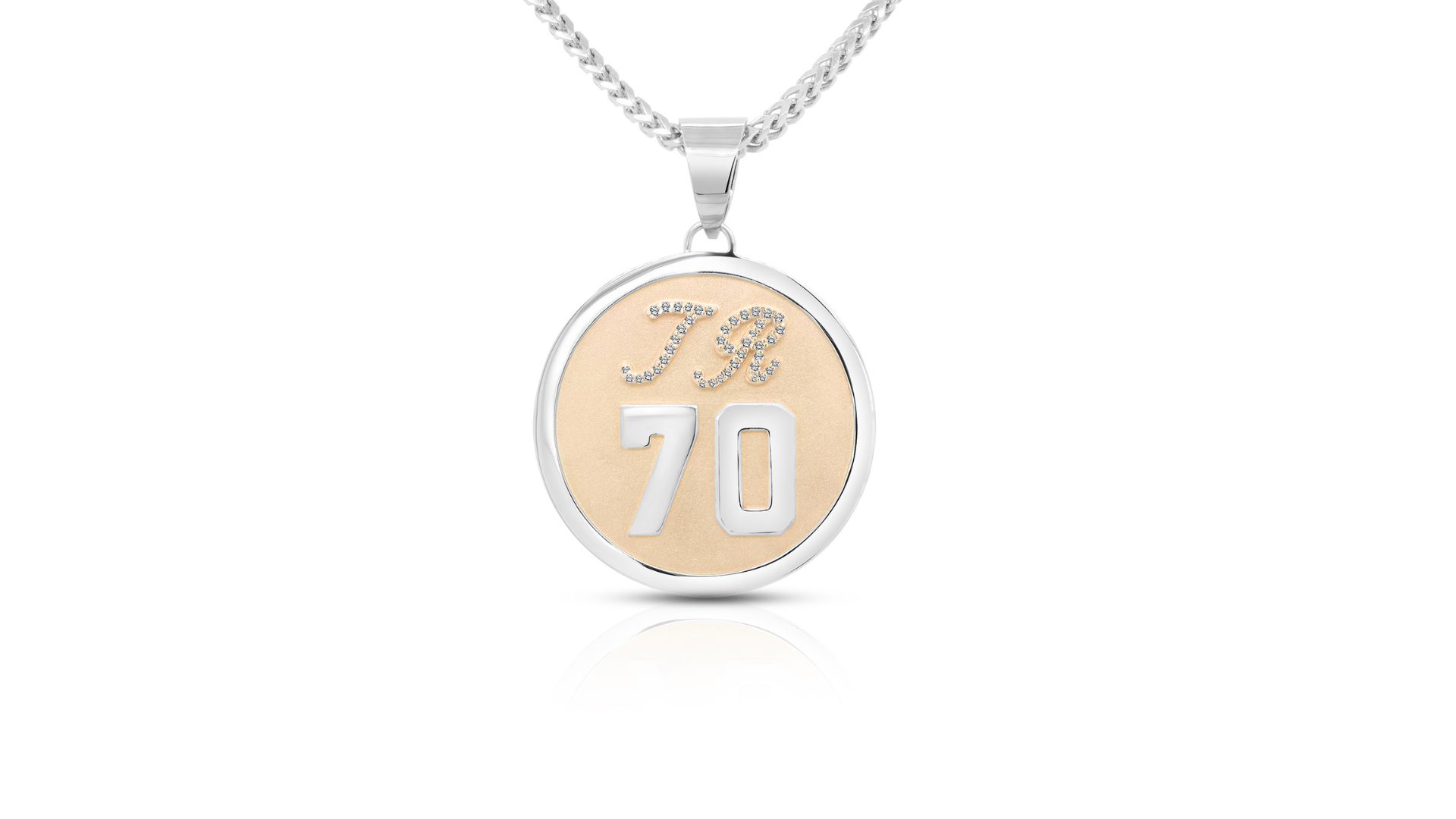 14 karat two-tone diamond initial and number pendant with diamond-set script TR initials and a bold 70 on a white gold chain, custom made at AJ's Jewelry in Queens NY