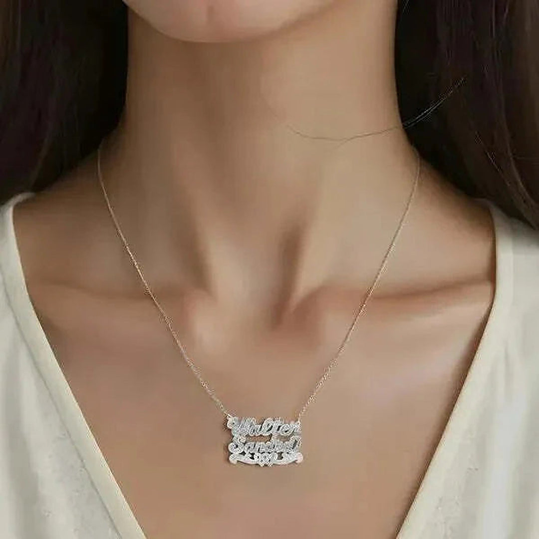 Model wearing the 14 Karat Two Name 3D Name Necklace with Intertwined Hearts in 14K white gold, name Walter | AJ's Jewelry